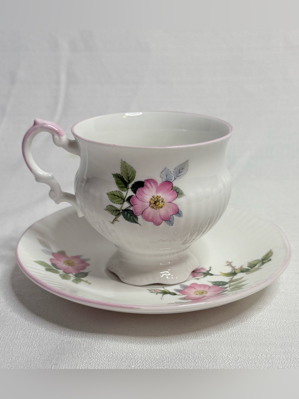 Elizabethan Staffordshire Hedgerow Footed Teacup Saucer Pink Floral Bone China